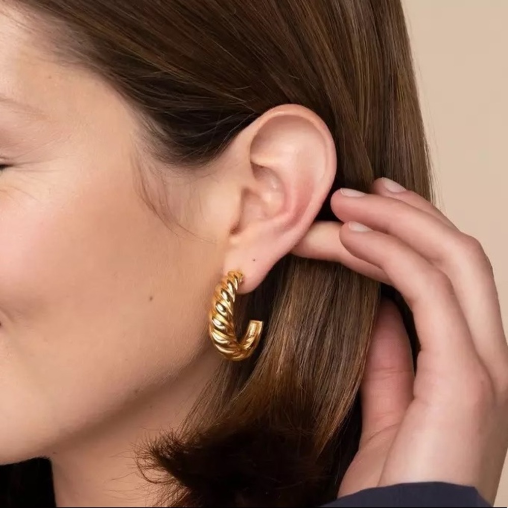 Gold croissant hoop earrings